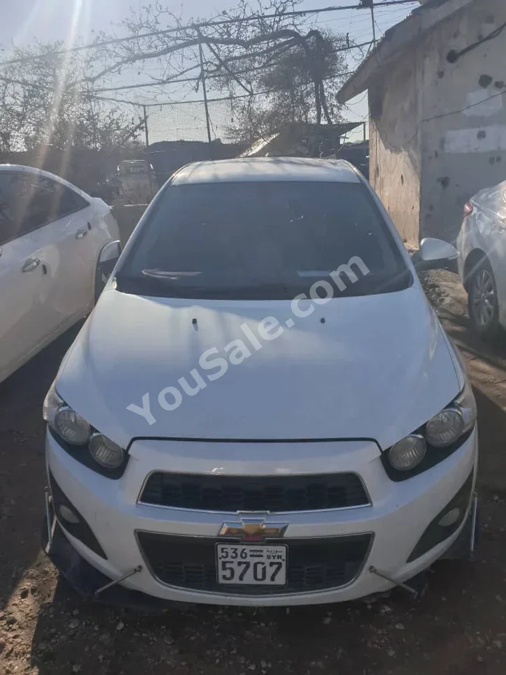 Chevrolet Aveo LS 2015 Automatic 124,000 km 4 Cylinder FWD Sedan White Gasoline