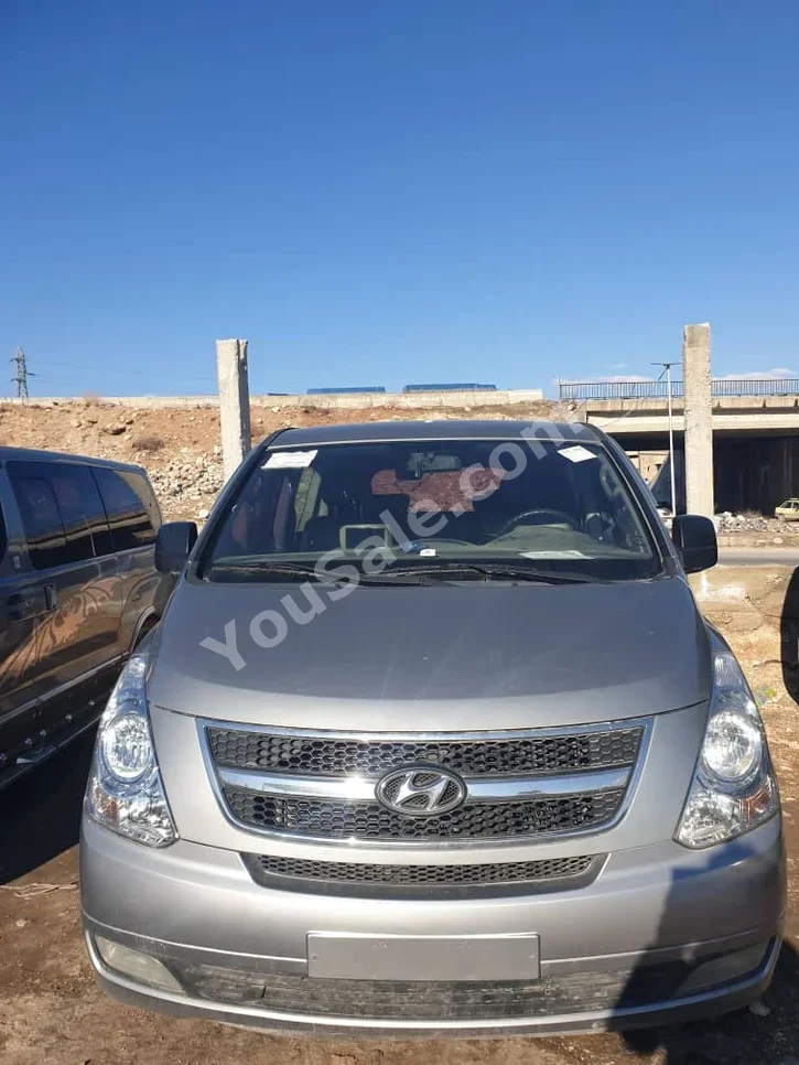 Hyundai  Van H1  2011  Manual  156,000 km  4 Cylinder  RWD  Van / Bus  Silver  Diesel
