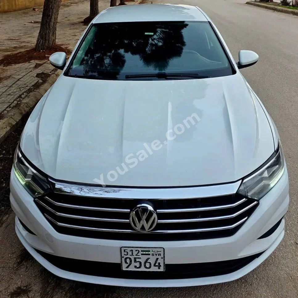 Volkswagen Jetta 2019 Automatic 121,000 km 4 Cylinder FWD Sedan White Gasoline