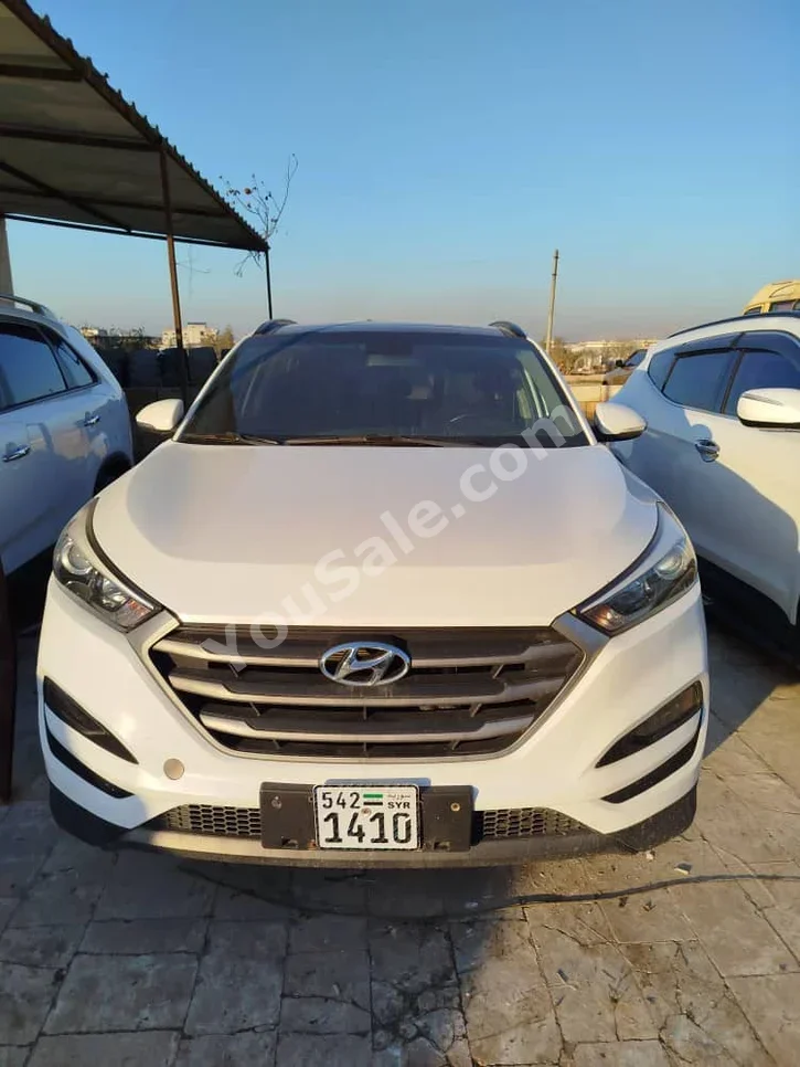 Hyundai  Tucson  2016  Automatic  65,000 km  4 Cylinder  FWD  SUV  White  Gasoline