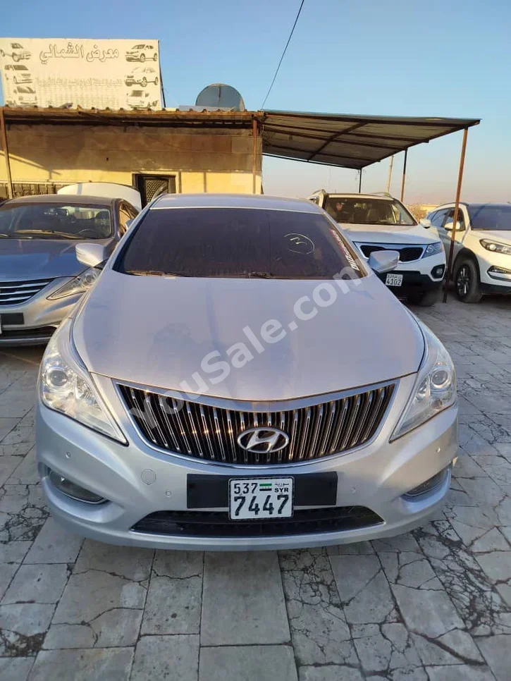 Hyundai Grandeur 2012 Automatic 80,000 km 4 Cylinder FWD Sedan Silver Gasoline
