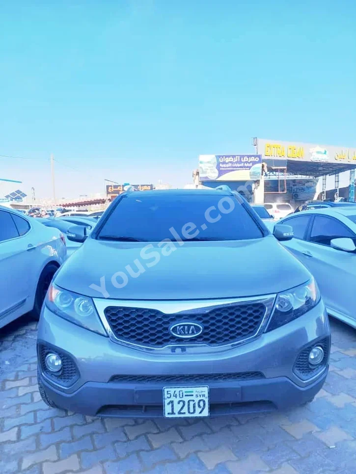 Kia  Sorento  2010  Automatic  150,000 km  4 Cylinder  FWD  SUV  Dark Gray  Diesel