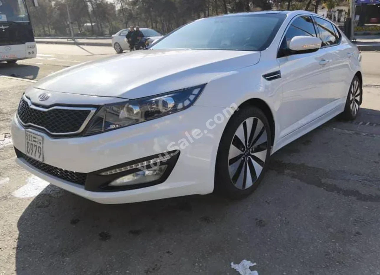 Kia  Optima  2012  Automatic  128,000 km  4 Cylinder  FWD  Sedan  White  Gasoline