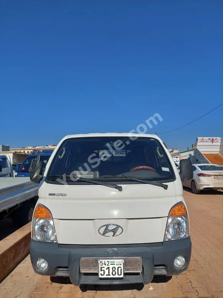 Hyundai Porter Porter 2009 Manual 95,000 km 4 Cylinder RWD Pick Up White Diesel