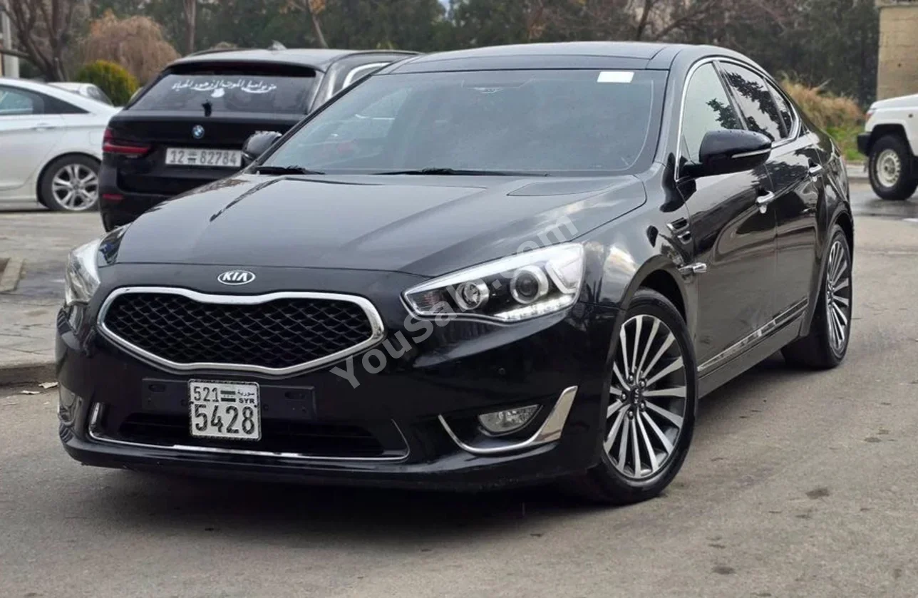 Kia  K3  2013  Automatic  100,000 km  4 Cylinder  FWD  Sedan  Black  Gasoline
