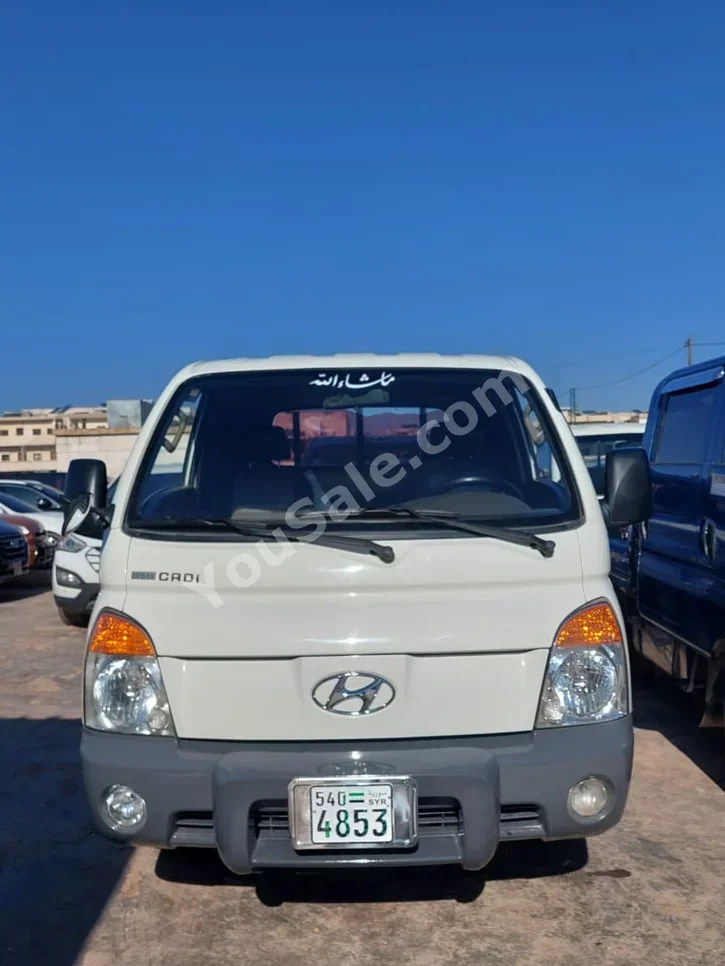 Hyundai  Porter  Porter  2011  Manual  106,000 km  4 Cylinder  RWD  Pick Up  White  Diesel