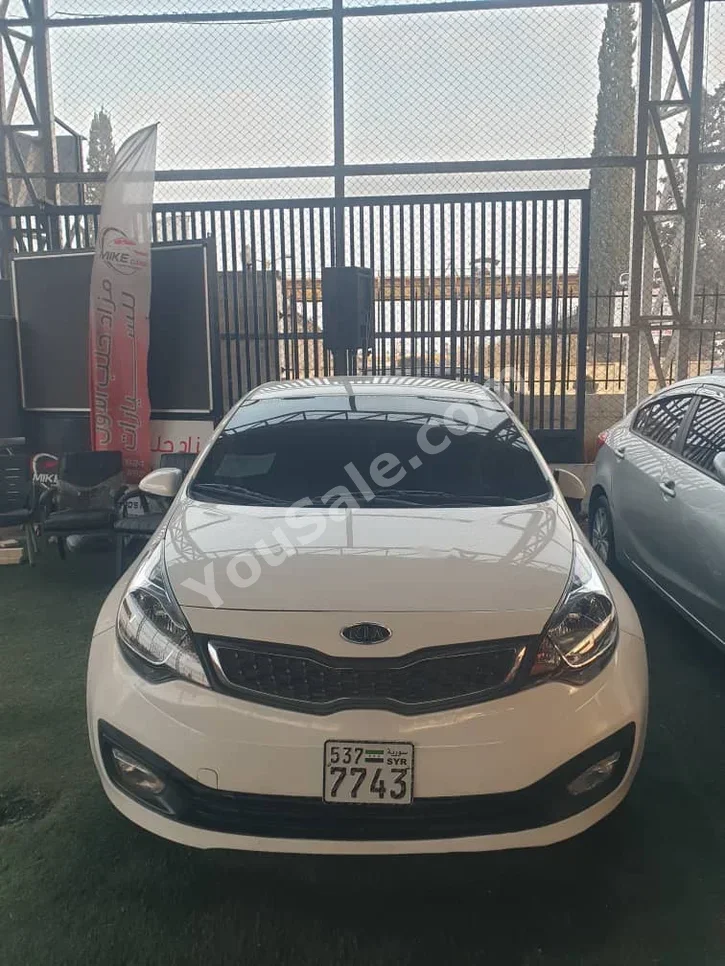 Kia Pride 2012 Automatic 13,000 km 4 Cylinder FWD Sedan White Gasoline