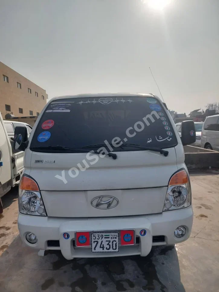 Hyundai  Porter  Porter  2011  Manual  123,000 km  4 Cylinder  RWD  Pick Up  White  Diesel