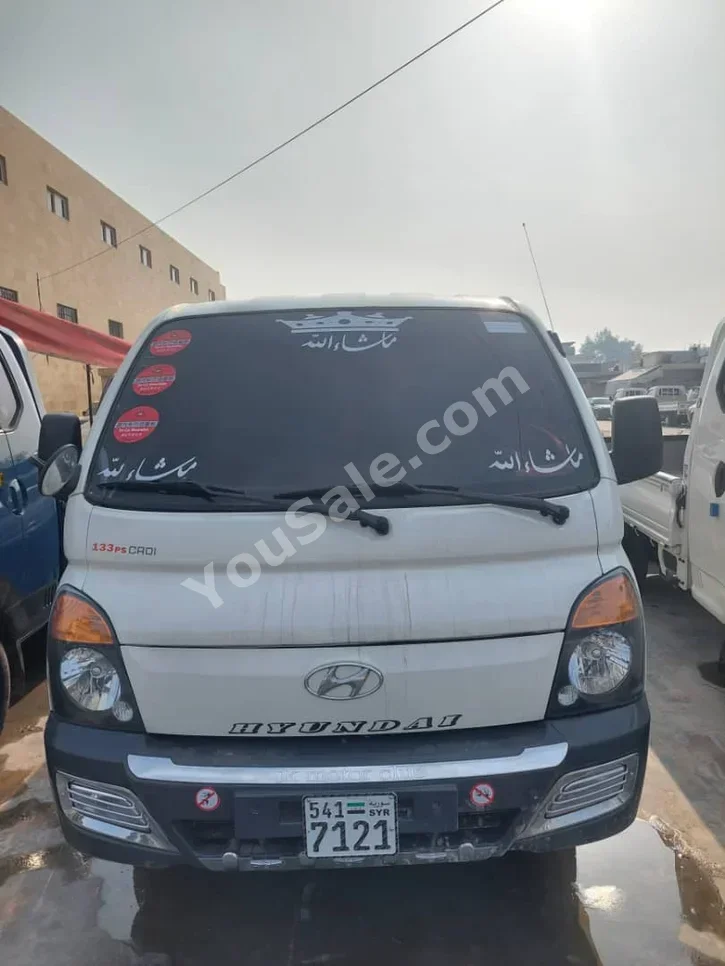Hyundai  Porter  Porter  2013  Automatic  136,000 km  4 Cylinder  RWD  Pick Up  White  Diesel