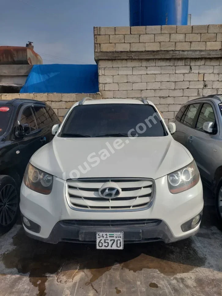 Hyundai Santa Fe 2009 Automatic 115,000 km 4 Cylinder FWD SUV White Diesel