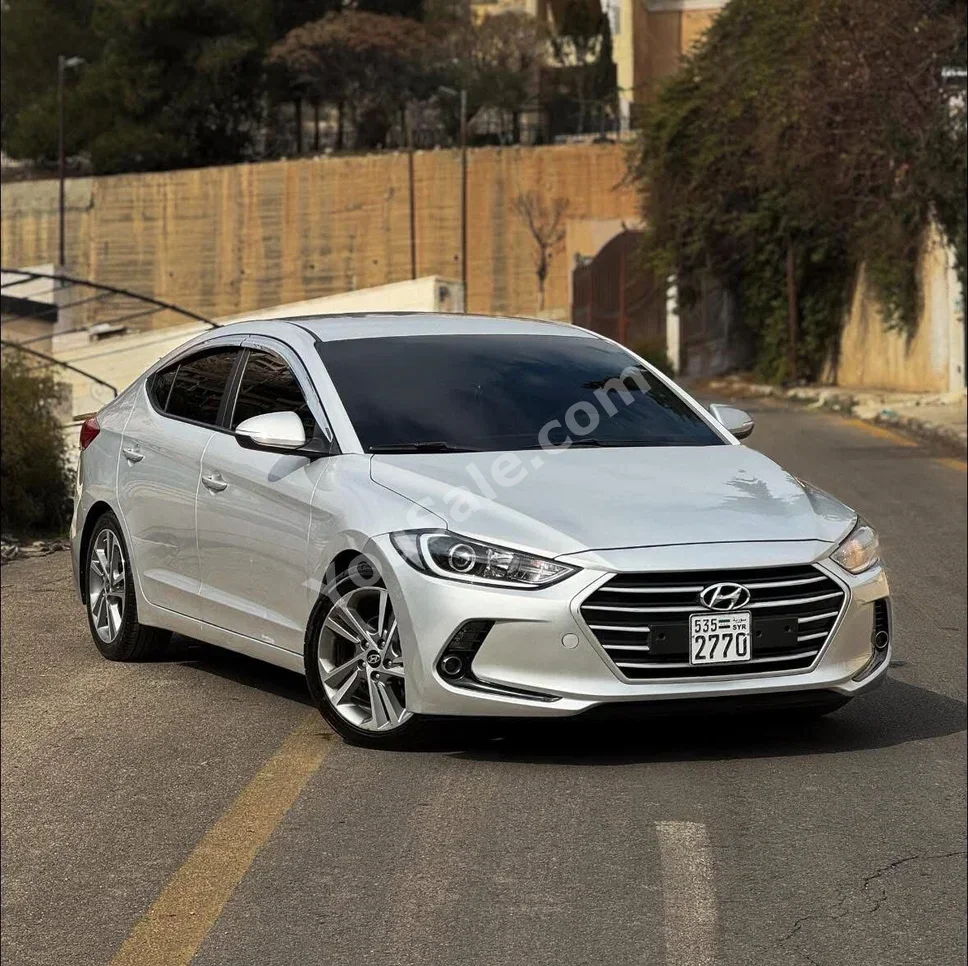 Hyundai  Elantra  2018  Automatic  100,000 km  4 Cylinder  FWD  Sedan  Silver  Gasoline