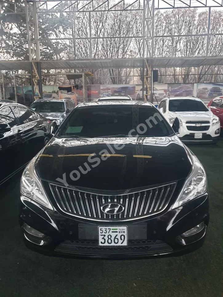 Hyundai  Grandeur  2014  Automatic  420,000 km  4 Cylinder  FWD  Sedan  Black  Hybrid