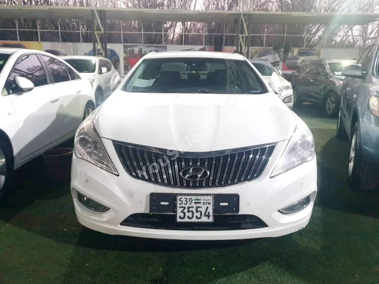 Hyundai Grandeur 2014 Automatic 81,000 km 6 Cylinder FWD Sedan White Gasoline