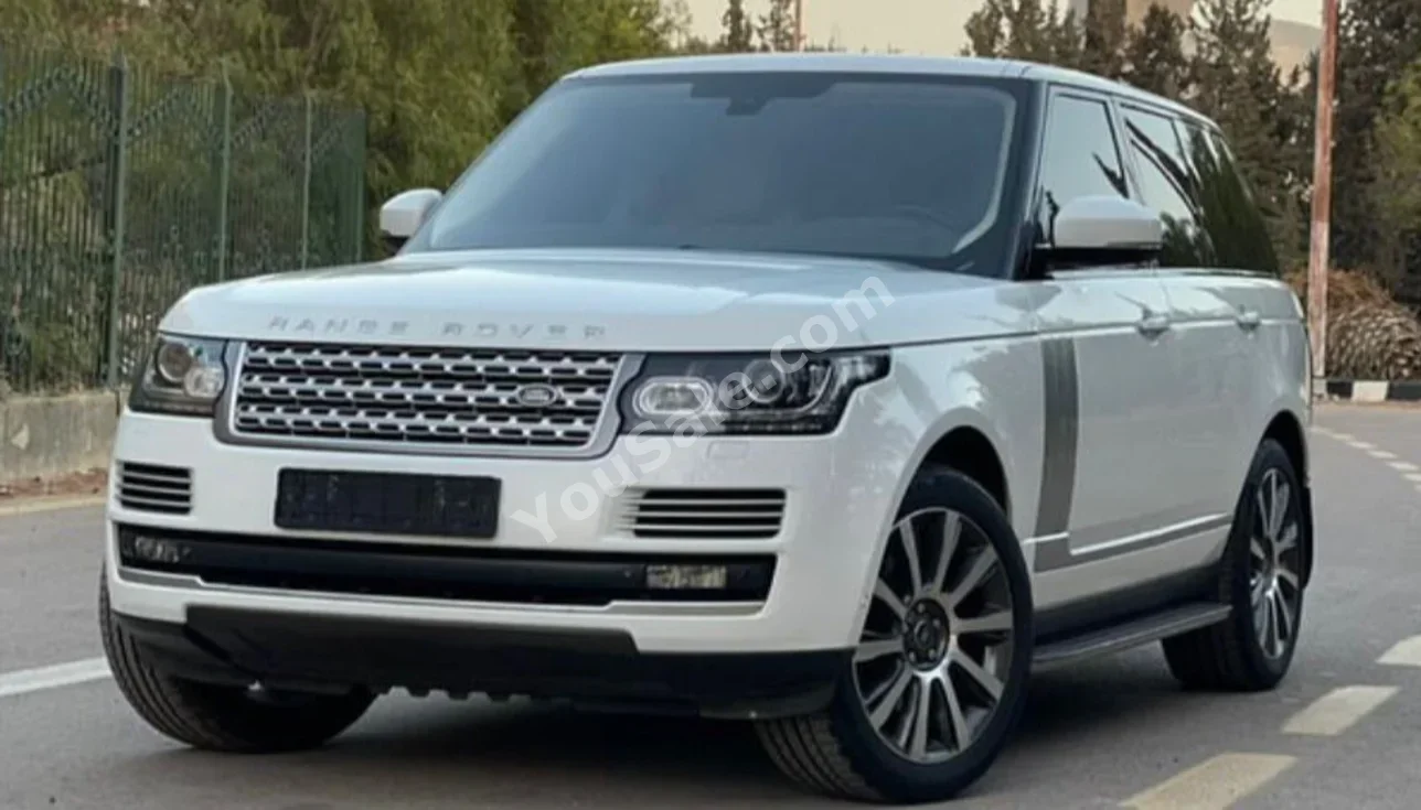 Land Rover  Range Rover  Vogue HSE  2015  Automatic  43,000 km  8 Cylinder  RWD  Sedan  White  Gasoline