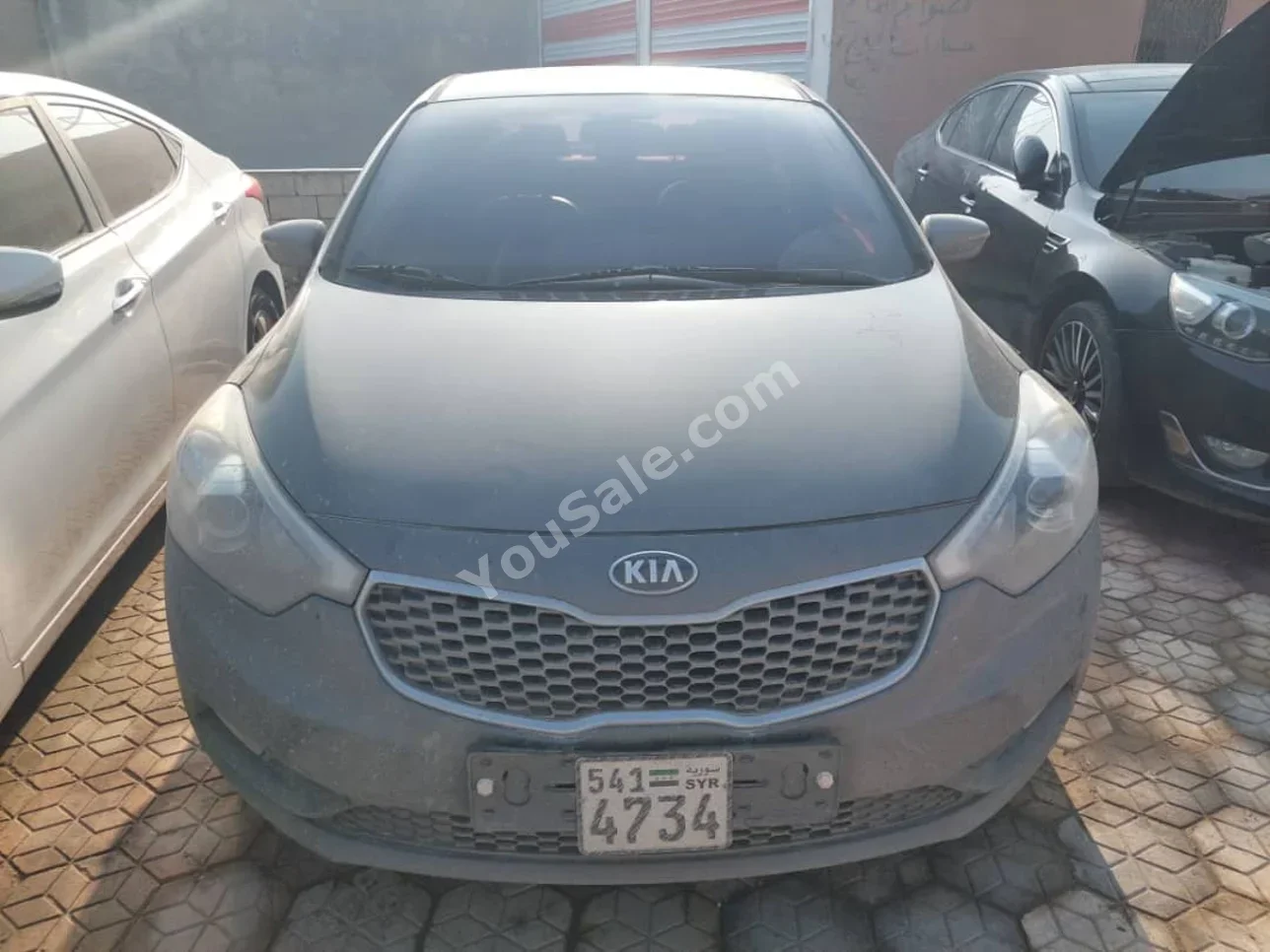 Kia K3 2013 Automatic 142,000 km 4 Cylinder FWD Sedan Dark Gray Gasoline