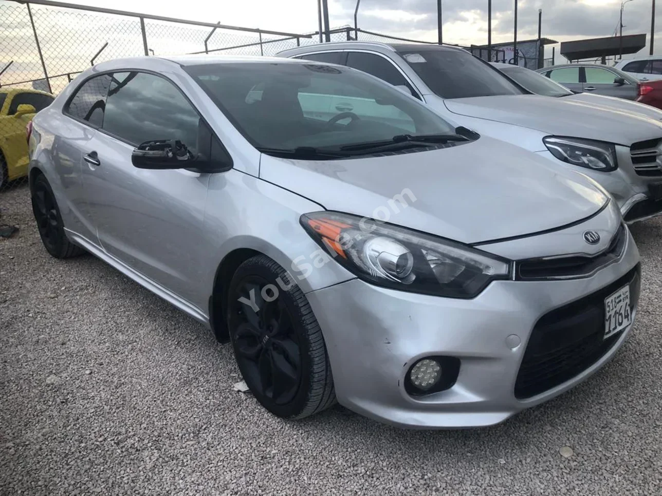 Kia  Forte  2015  Automatic  119,000 km  4 Cylinder  FWD  Coupe / Sport  Silver  Gasoline