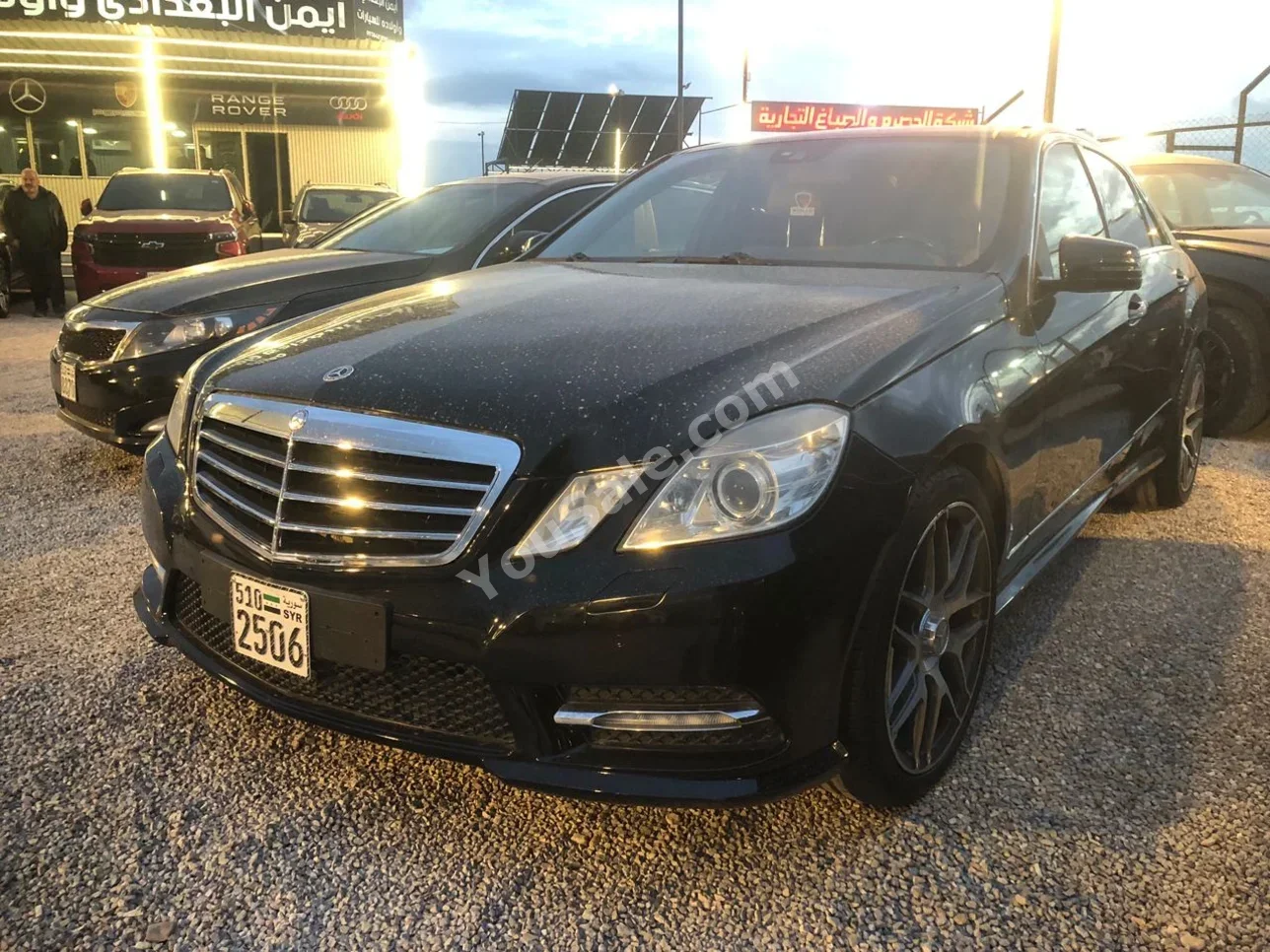 Mercedes-Benz  E-Class  300  2011  Automatic  194,000 km  6 Cylinder  RWD  Sedan  Black  Gasoline