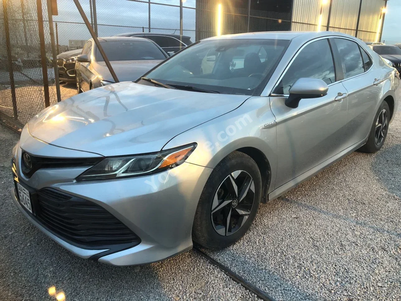 Toyota  Camry  LE  2020  Automatic  68,000 km  4 Cylinder  FWD  Sedan  Silver  Hybrid