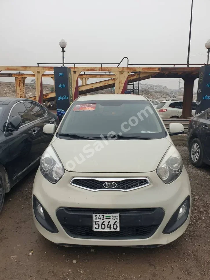 Kia  Picanto  2012  Automatic  141,000 km  4 Cylinder  FWD  Hatchback  Beige  Gasoline