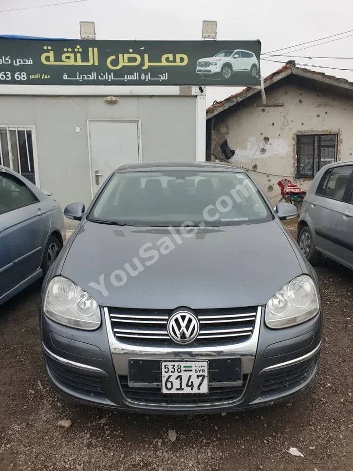 Volkswagen Jetta 2011 Automatic 142,000 km 4 Cylinder FWD Sedan Gray Diesel