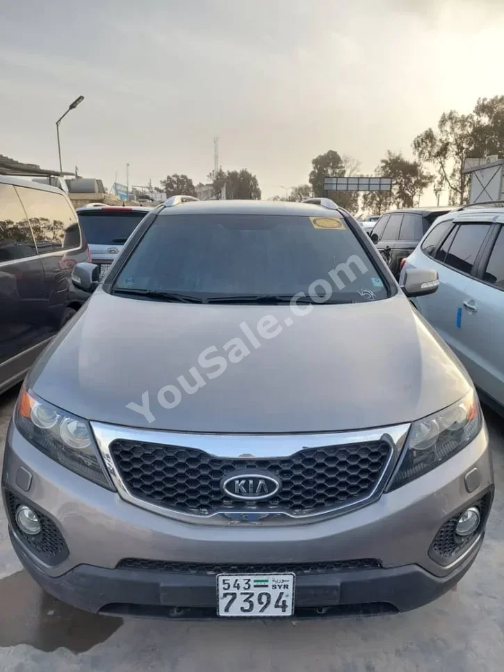 Kia  Sorento  2012  Automatic  188,000 km  4 Cylinder  FWD  SUV  Gray  Diesel