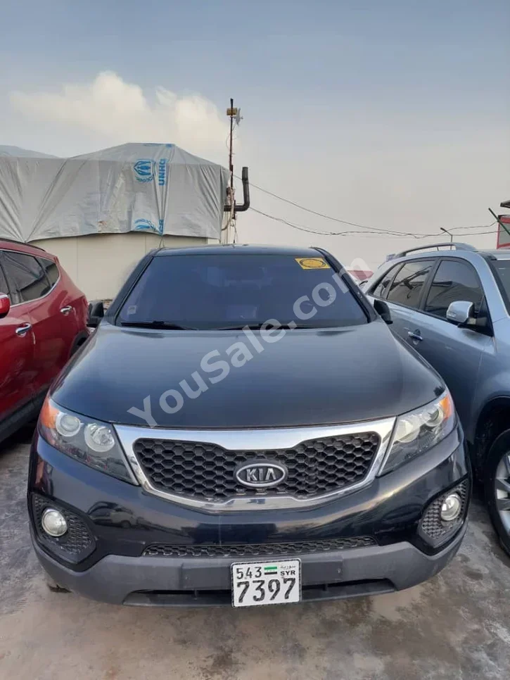 Kia  Sorento  2012  Automatic  132,000 km  4 Cylinder  FWD  SUV  Black  Diesel