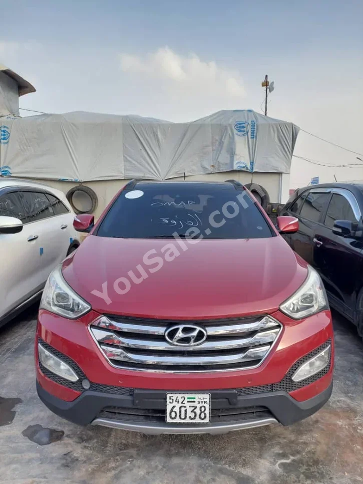 Hyundai  Santa Fe  2013  Automatic  113,000 km  4 Cylinder  FWD  SUV  Red  Diesel
