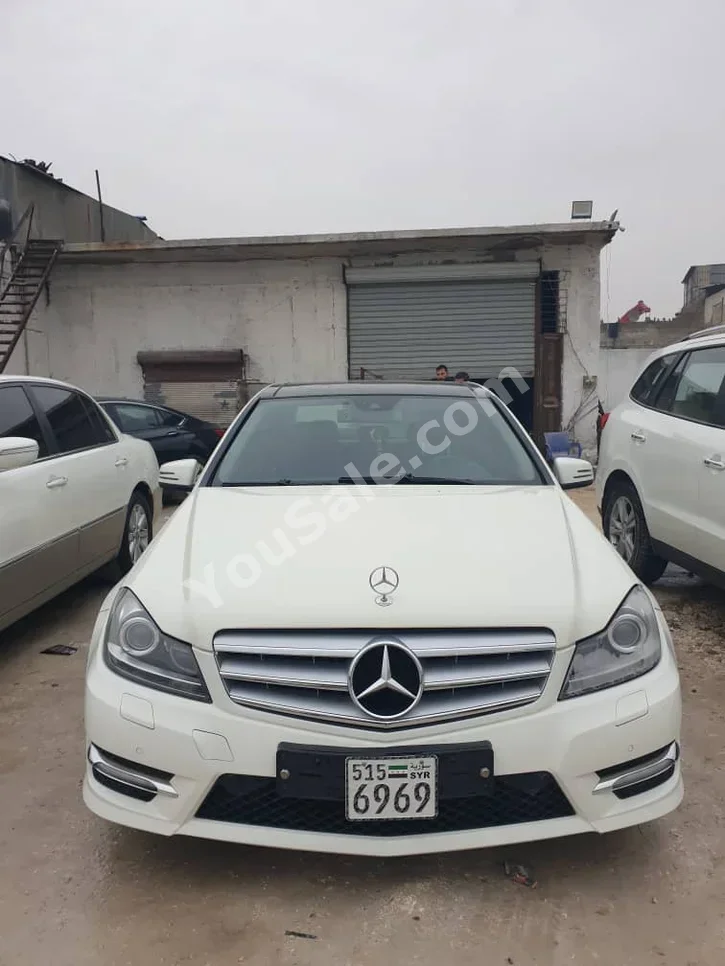 Mercedes-Benz  C-Class  220  2012  Automatic  122,000 km  6 Cylinder  RWD  Sedan  White  Diesel