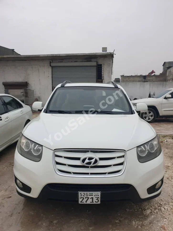 Hyundai  Santa Fe  2012  Automatic  86,000 km  4 Cylinder  FWD  SUV  White  Gasoline