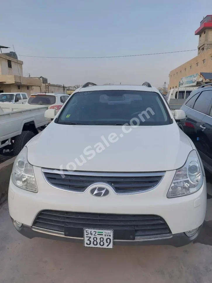 Hyundai  Veracruz  2009  Automatic  185,000 km  4 Cylinder  FWD  SUV  White  Diesel