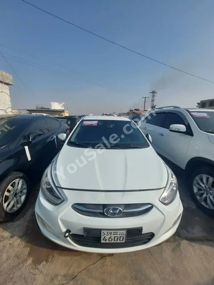 Hyundai  Accent  2016  Automatic  177,000 km  4 Cylinder  FWD  Sedan  White  Gasoline