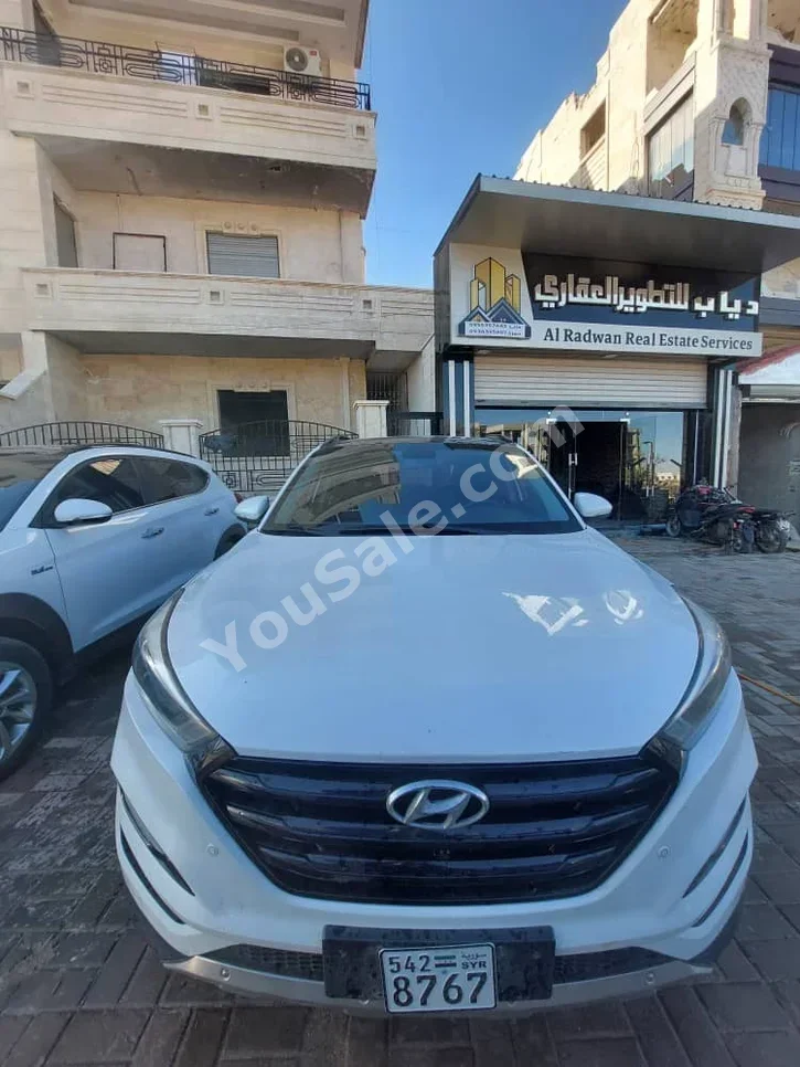 Hyundai  Tucson  2016  Automatic  142,000 km  4 Cylinder  FWD  SUV  White  Gasoline