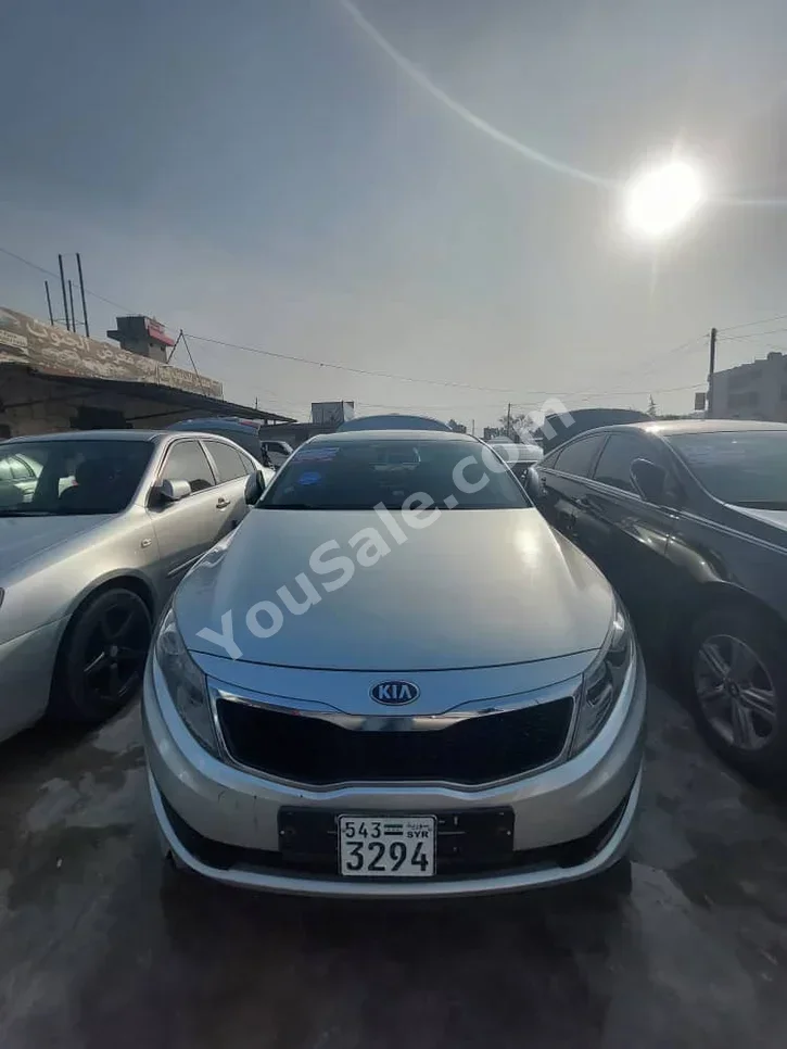 Kia  K5  2012  Automatic  176,000 km  4 Cylinder  FWD  Sedan  Silver  Gasoline