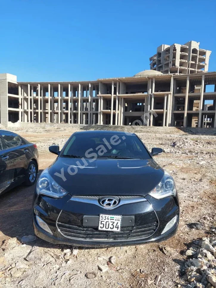 Hyundai  Veloster  2012  Automatic  128,000 km  4 Cylinder  FWD  Hatchback  Black  Gasoline