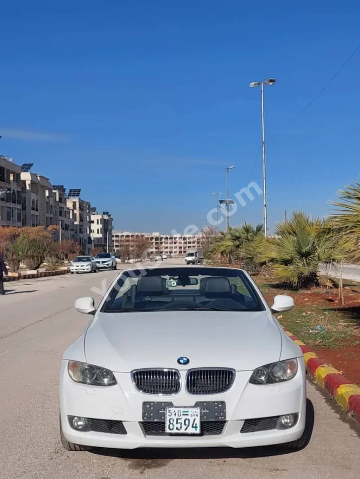 BMW  3-Series  328i  2009  Automatic  154,000 km  6 Cylinder  RWD  Coupe / Sport  White  Gasoline