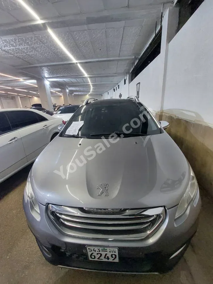 Peugeot  2008  2015  Automatic  106,000 km  4 Cylinder  FWD  SUV  Silver  Diesel