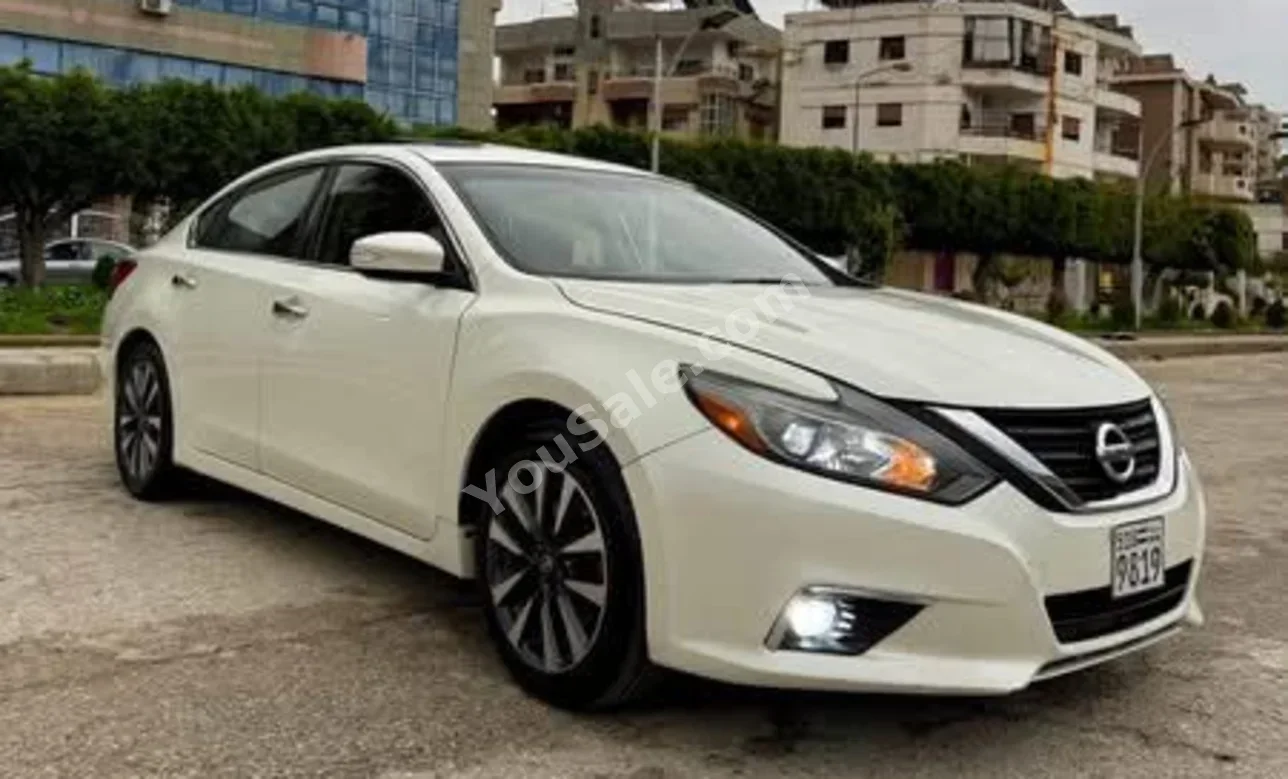 Nissan  Altima  2017  Automatic  179,000 km  4 Cylinder  FWD  Sedan  White  Gasoline