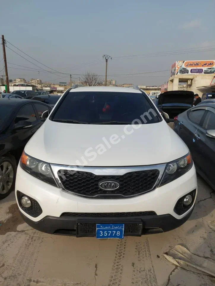 Kia  Sorento  2010  Automatic  128,000 km  4 Cylinder  FWD  SUV  White  Diesel