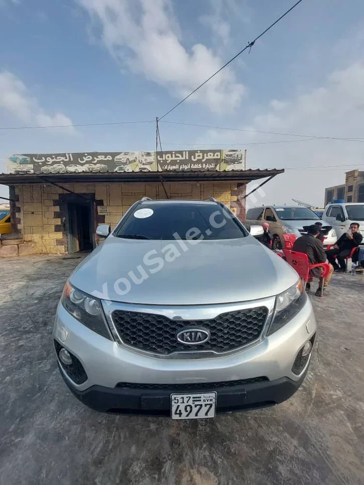 Kia  Sorento  2011  Automatic  119,000 km  4 Cylinder  FWD  SUV  Silver  Diesel