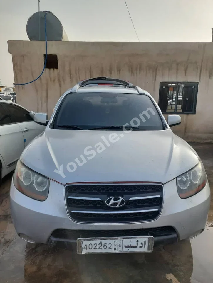 Hyundai Santa Fe 2009 Automatic 114,000 km 4 Cylinder FWD SUV Silver Diesel