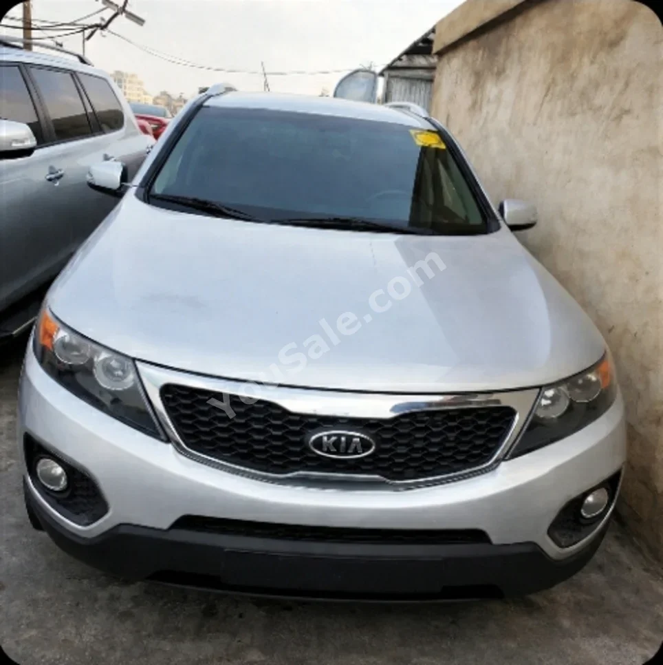 Kia  Sorento  2014  Automatic  152,000 km  4 Cylinder  FWD  SUV  Silver  Diesel