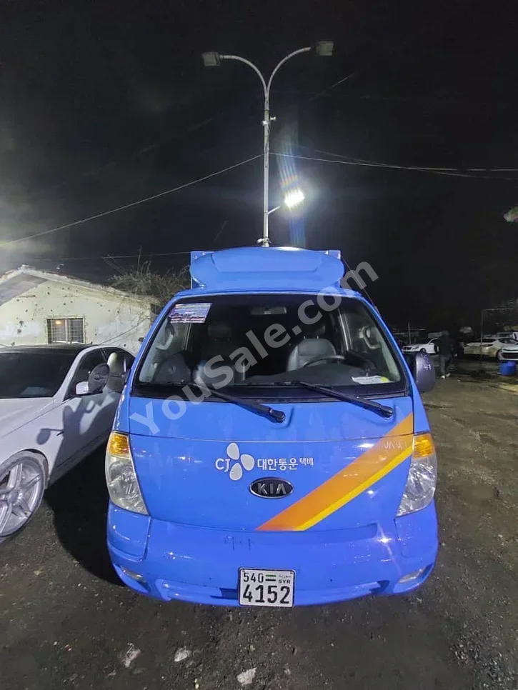 Kia  Bongo  2011  Automatic  120,000 km  4 Cylinder  RWD  Pick Up  Blue  Diesel