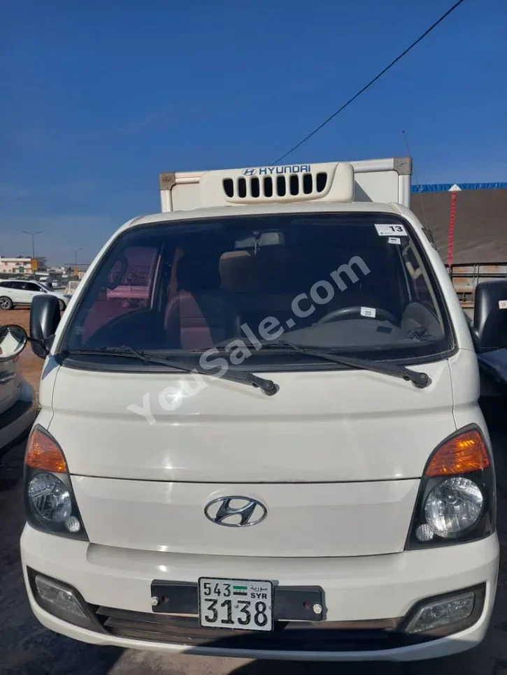 Hyundai  Porter  Porter  2014  Manual  125,000 km  4 Cylinder  RWD  Pick Up  White  Diesel