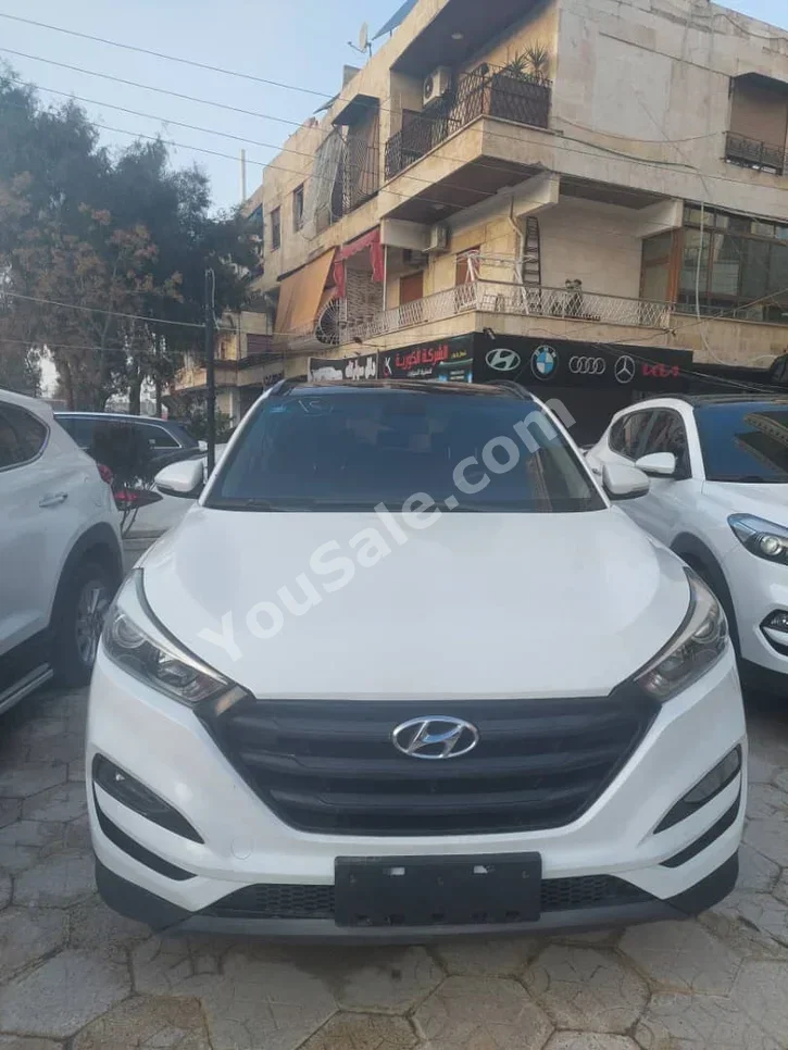 Hyundai  Tucson  2017  Automatic  158,000 km  4 Cylinder  FWD  SUV  White  Gasoline