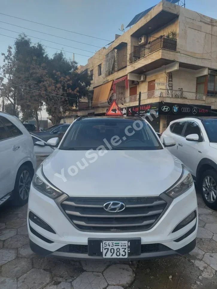 Hyundai  Tucson  2017  Automatic  122,000 km  4 Cylinder  FWD  SUV  White  Gasoline