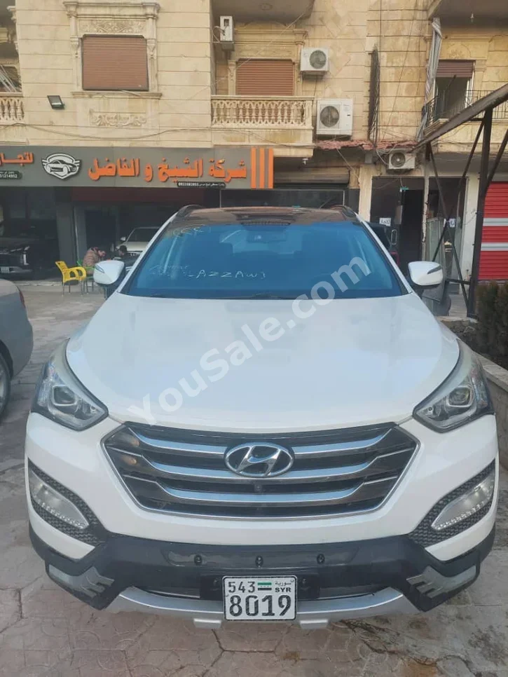Hyundai  Santa Fe  2015  Automatic  112,000 km  4 Cylinder  FWD  SUV  White  Gasoline