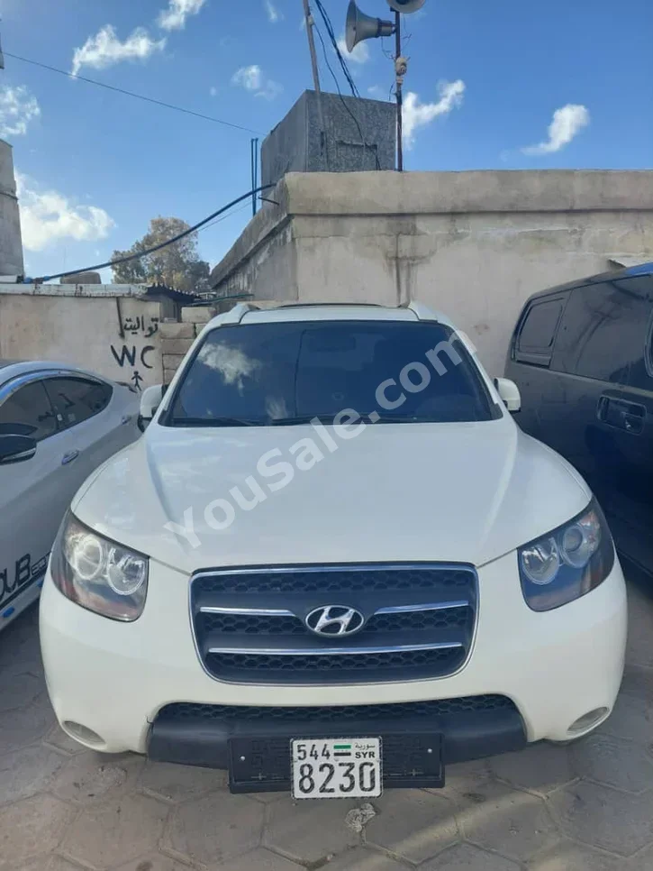 Hyundai Santa Fe 2009 Automatic 184,000 km 4 Cylinder FWD SUV White Diesel