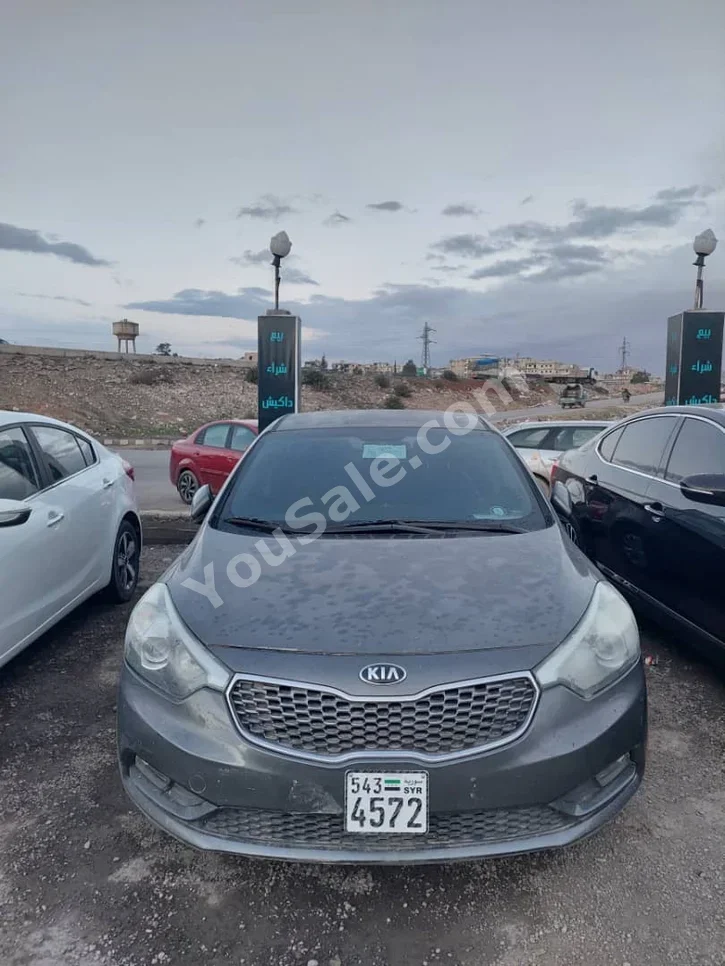 Kia  K3  2014  Automatic  108,000 km  4 Cylinder  FWD  Sedan  Gray  Gasoline
