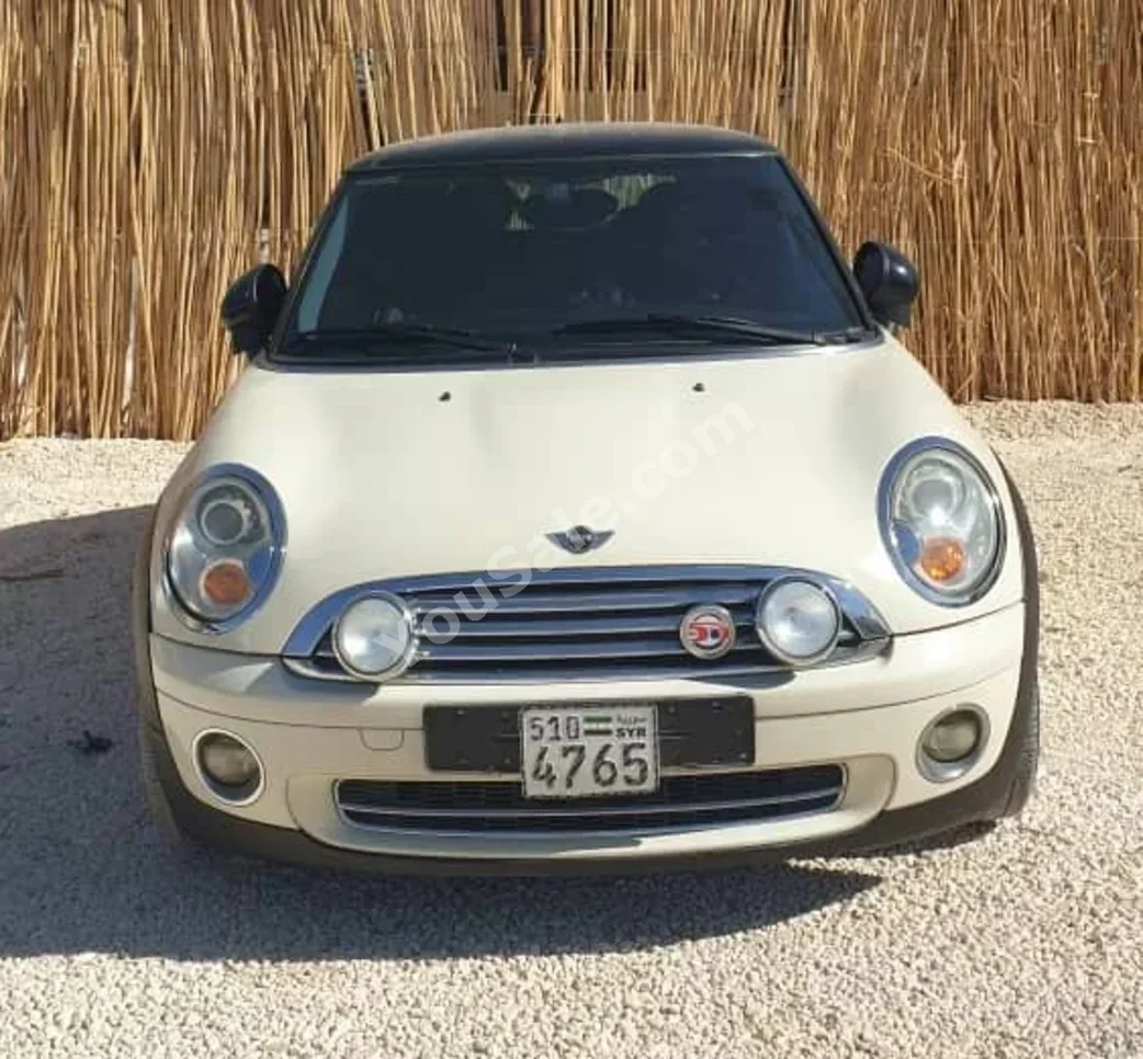 ميني كوبر 2011 اتوماتيك 123,000 كم 4 سلندر دفع أمامي كوبيه \ سبورت بيج بنزين