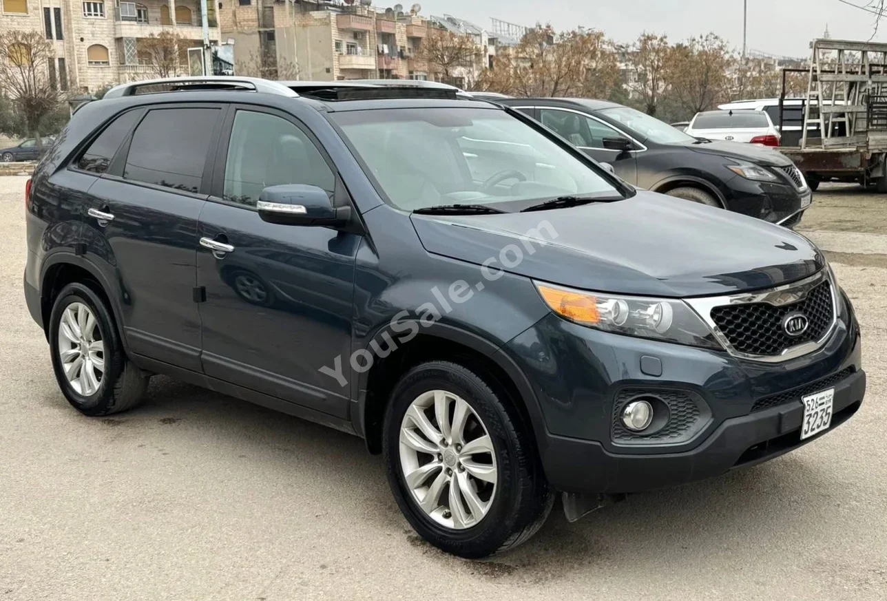 Kia  Sorento  2010  Automatic  161,000 km  4 Cylinder  AWD  SUV  Gray  Diesel